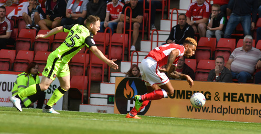 Swindon Town boss David Flitcroft replaced Kaiyne Woolery primarily for tactical reasons