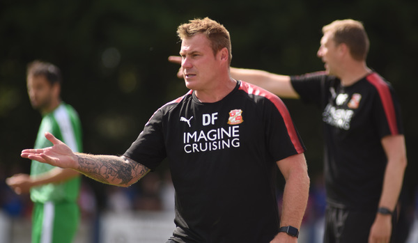 Swindon Town fans booed the team because they want the team to do well, says David Flitcroft