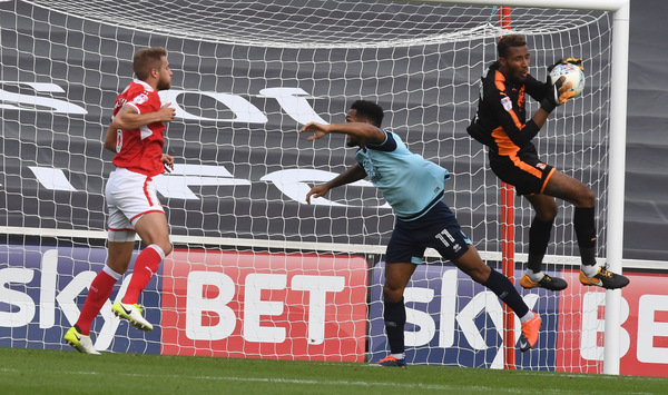 Signing of Stuart Moore will led to departures of Lawrence Vigouroux and Will Henry from Swindon Town