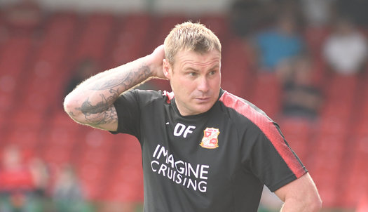 How do Swindon Town move on from David Flitcroft's nine-month stint in charge?